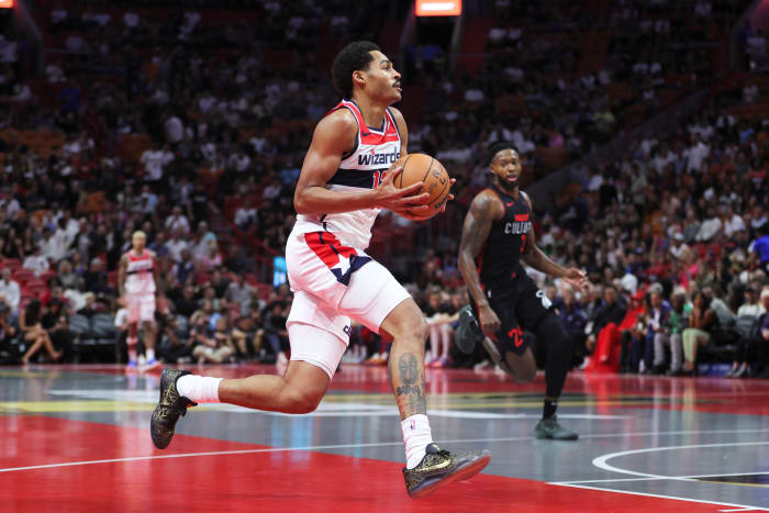 Washington Wizards guard Jordan Poole (13) drives to the basket against the Miami Heat during the first quarter at Kaseya Center.